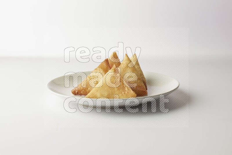 sambosas on a white background