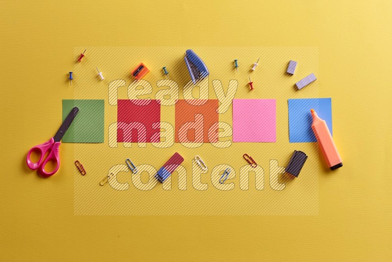 Multicolored sticky notes with school supplies on yellow background (Back to school)