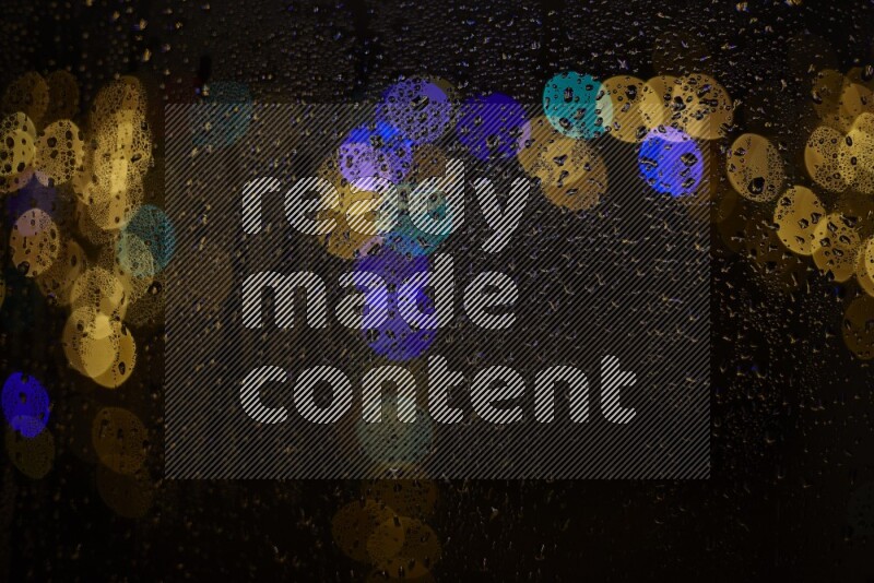 Bokeh light in multicolor with water drops