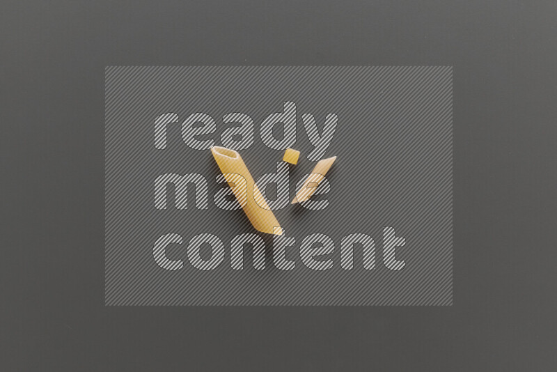 Different pasta types on grey background