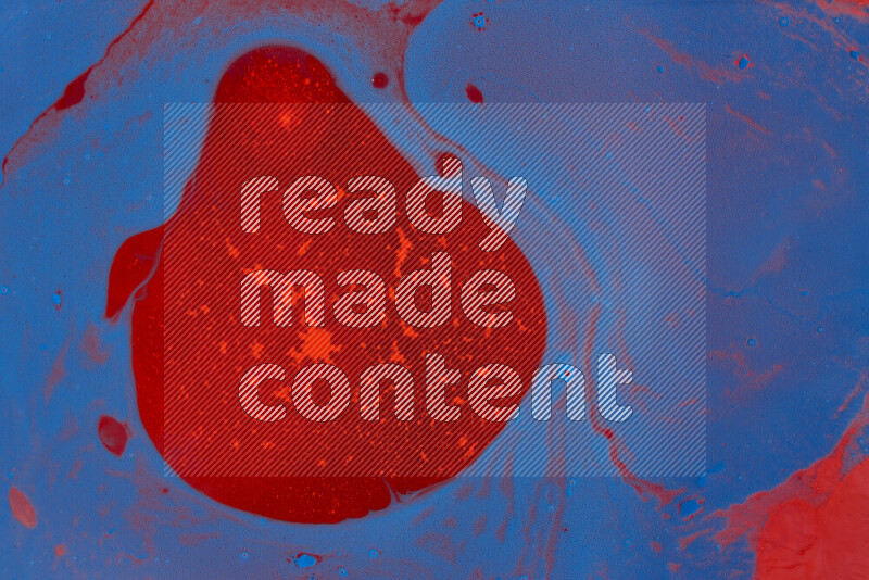 The image depicts a marbling effect with swirling patterns of red and blue