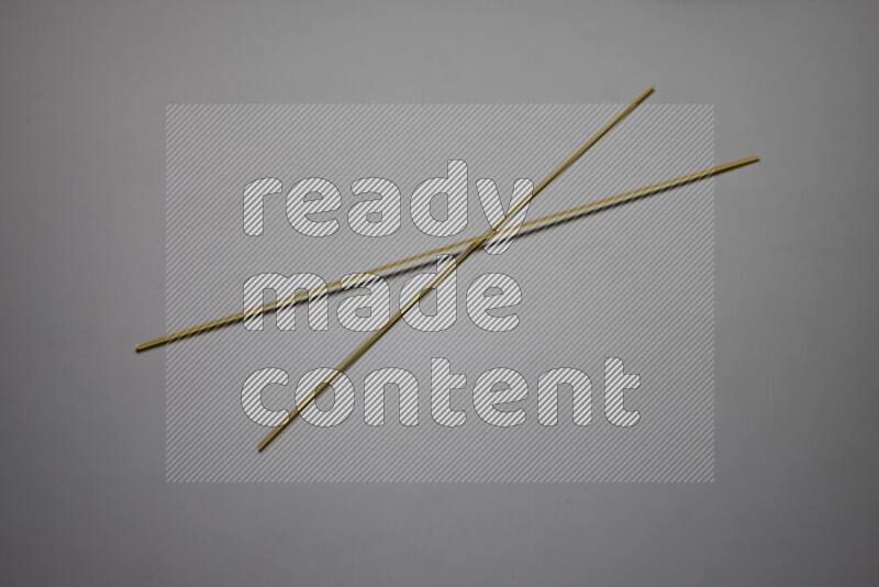 Spaghetti pasta on grey background