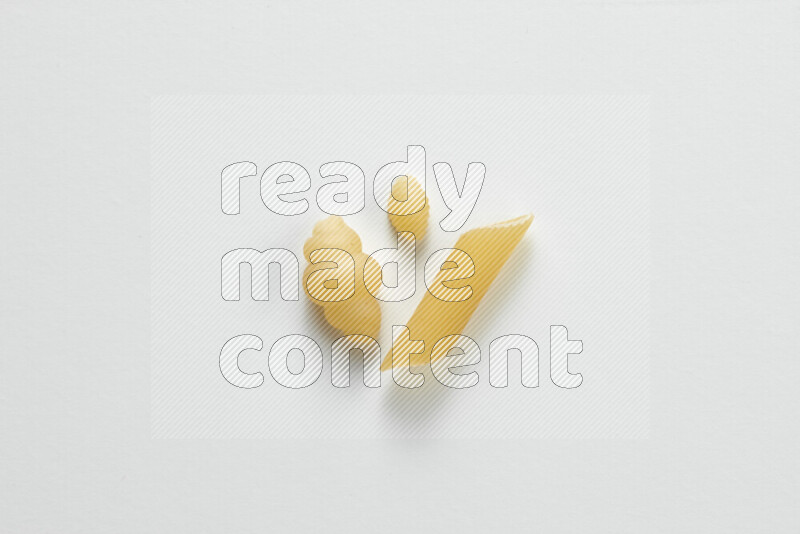 Different pasta types on white background