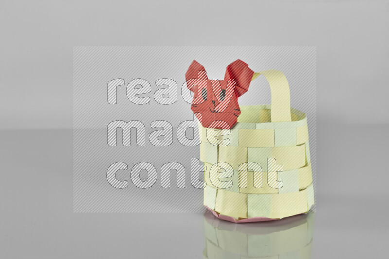 Origami animals on grey background