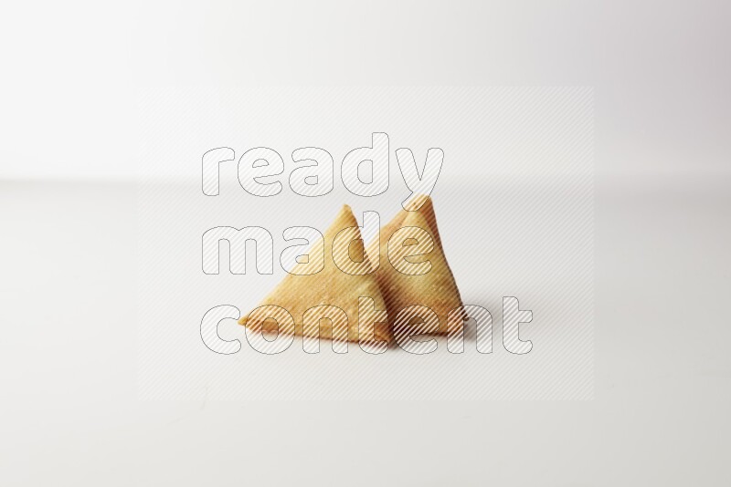 sambosas on a white background