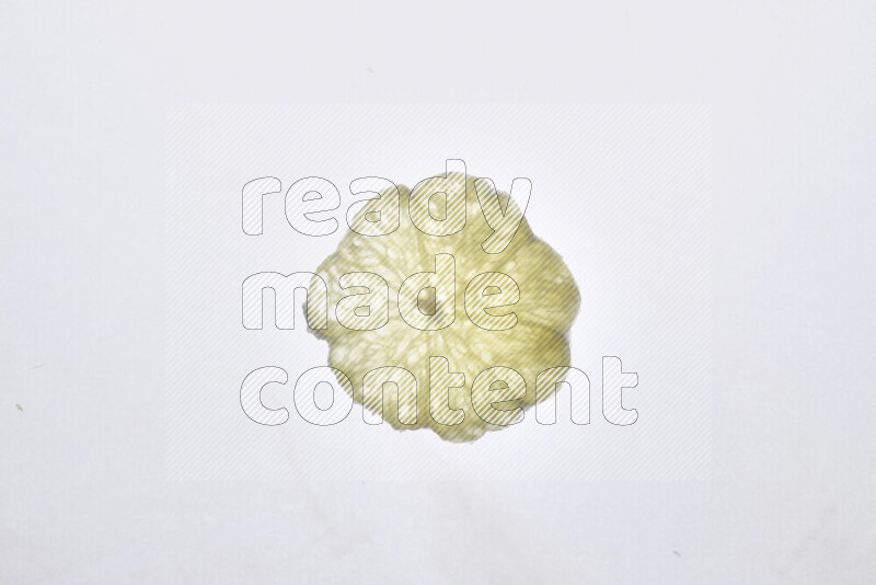 Orange slices on illuminated white background