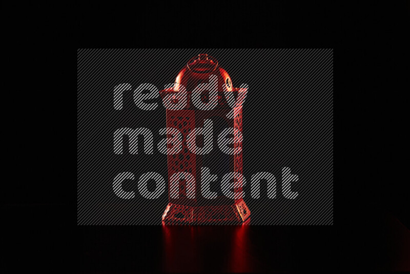 Ramadan lanterns with colored rim light against black background