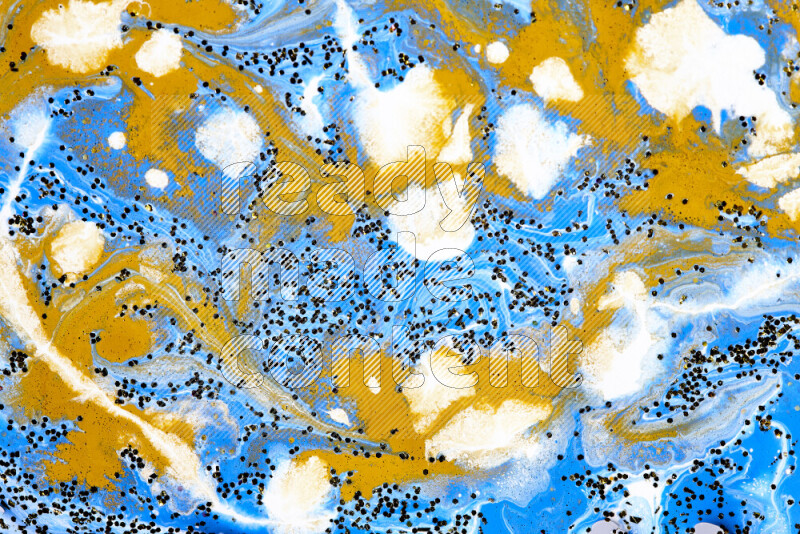 Abstract colorful background with mixed of blue, white and gold paint colors with scattered gold glitter