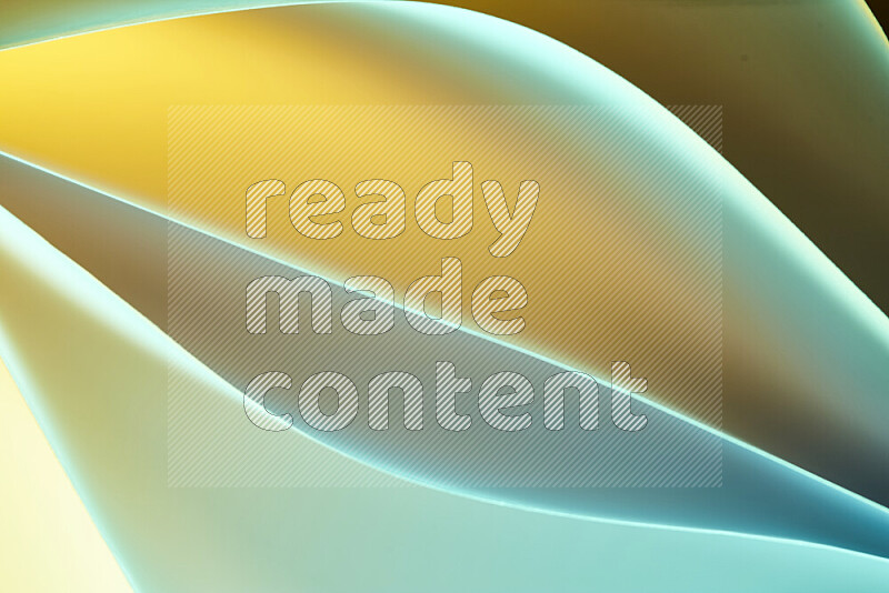 This image showcases an abstract paper art composition with paper curves in green and yellow gradients created by colored light
