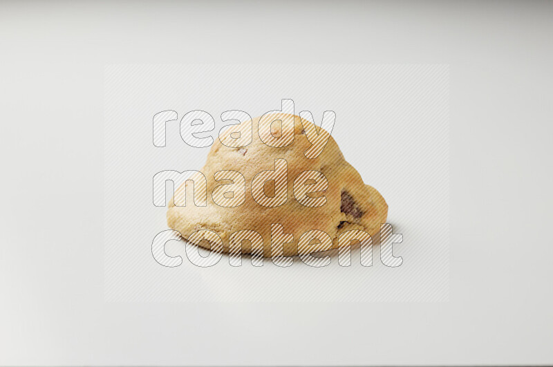 a chocolate chip cookie on a white background