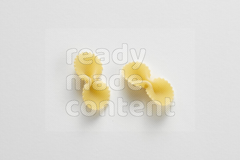 Fiocchi pasta on white background