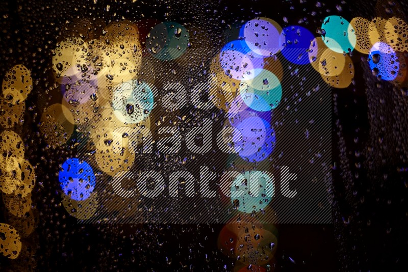 Bokeh light in multicolor with water drops