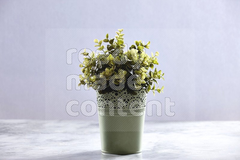 Artificial Plant in Light Green Decorative Pot on Light Grey Marble Flooring 15 degree angle