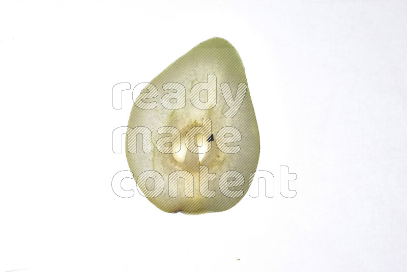 Pear slices on illuminated white background
