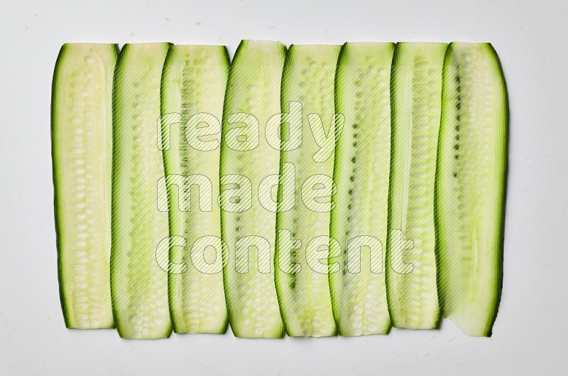 cucumber ribbons on a white background