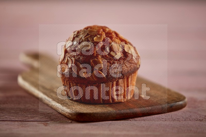 Almond cupcake on a wooden board