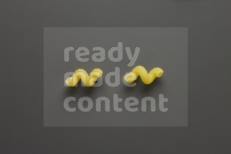 Twist pasta on grey background
