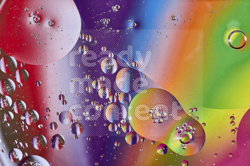 Close-ups of abstract oil bubbles on water surface in multicolors
