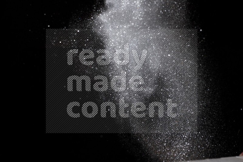 Silver glitter powder isolated on black background