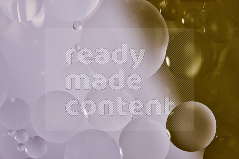 لقطات مقربة لفقاعات من الزيت على سطح الماء باللون الأبيض والبني