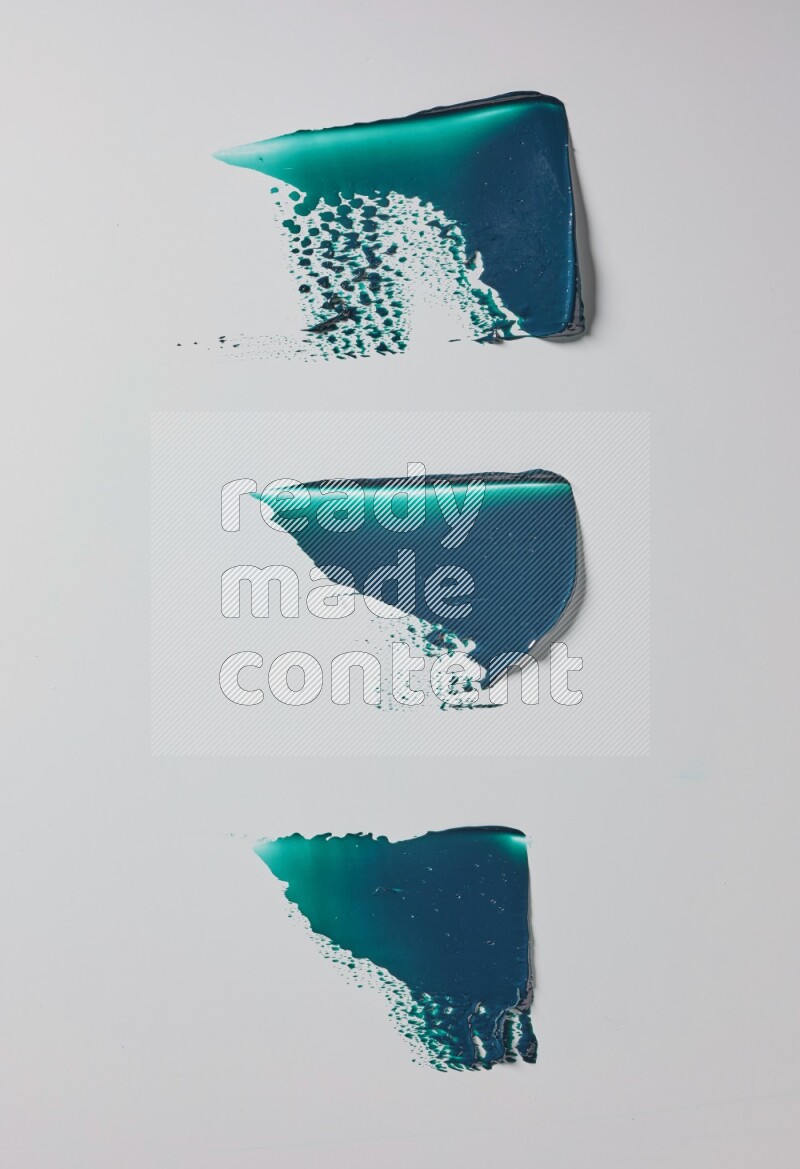 Turquoise painting knife strokes in on white background