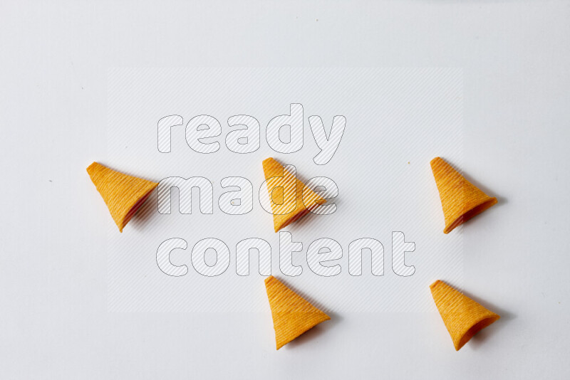Assorted snacks on white background