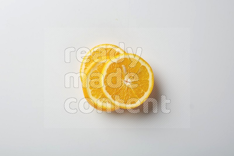 Three orange slices on a white background