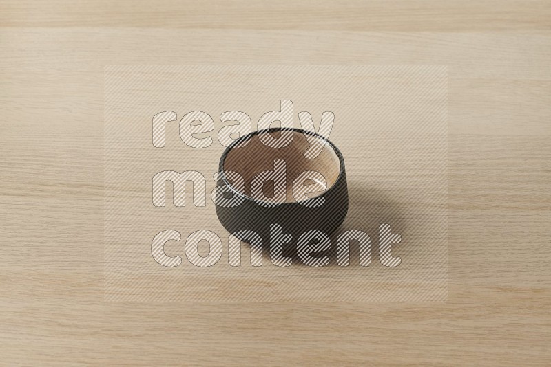 Multicolored Pottery Bowl on Oak Wooden Flooring, 45 degrees