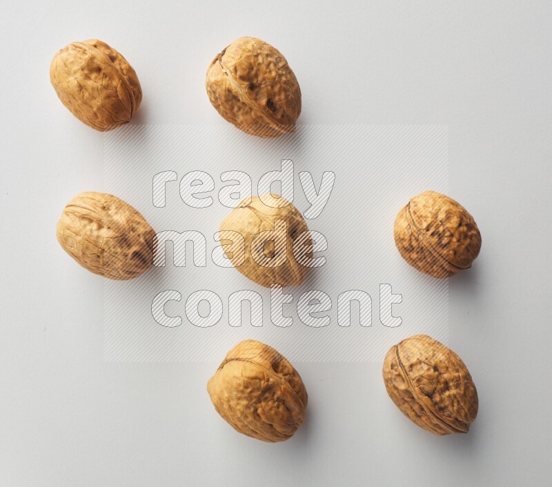 Top-view shot of walnut on white background