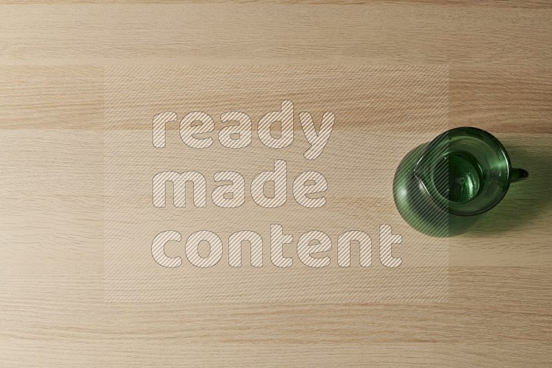 Top View Shot Of An Empty Glass Jug on Oak Wooden Flooring