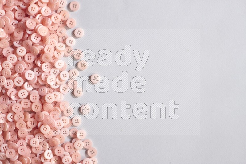 Rose buttons placed on grey background