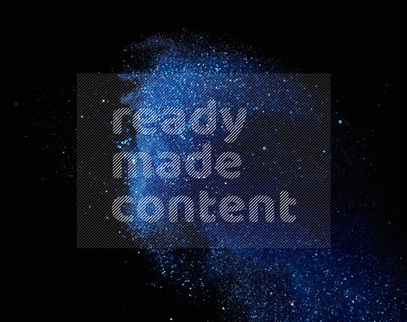 Blue glitter powder isolated on black background