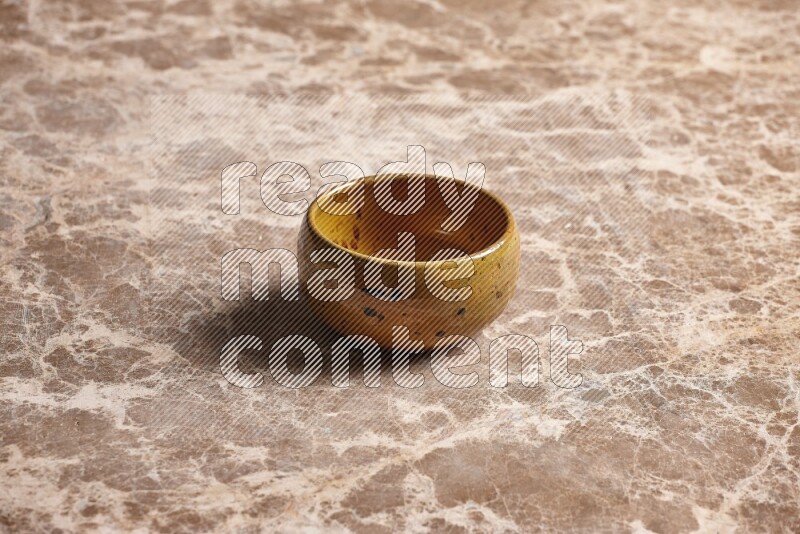 Multicolored Pottery Bowl on Beige Marble Flooring
