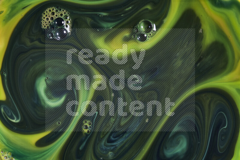 A close-up of abstract swirling patterns in orange and green