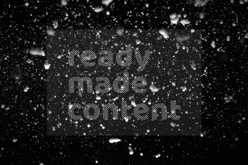Snow spray on black background