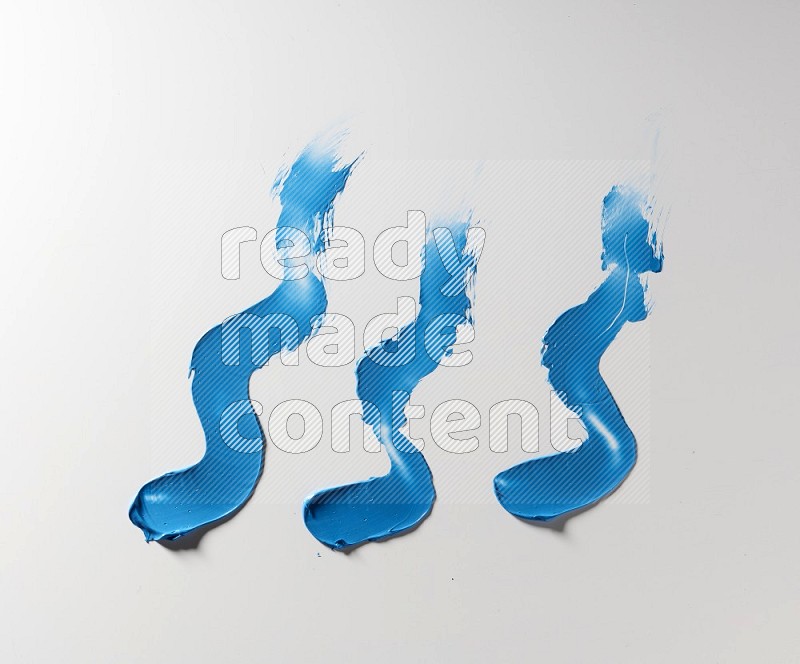 Blue zigzag painting knife strokes on white background
