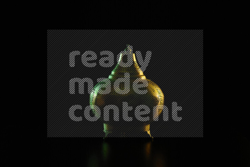 Ramadan lanterns with colored rim light against black background