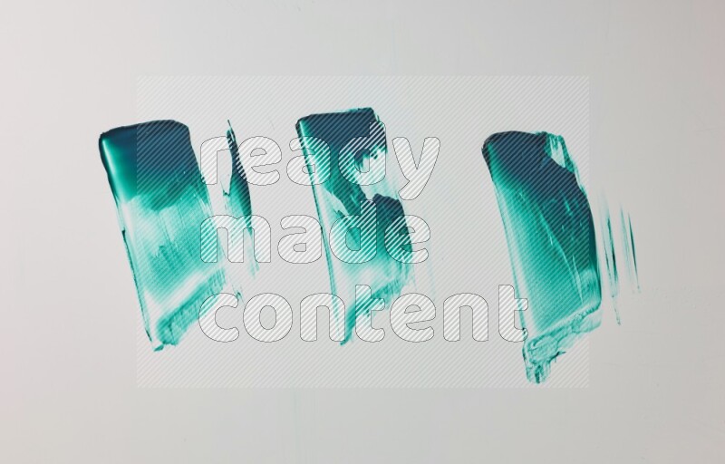 Turquoise painting knife strokes on white background