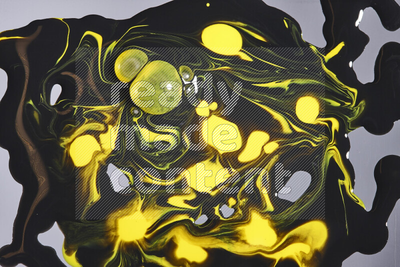 Abstract colorful background with mixed of yellow and black paint colors