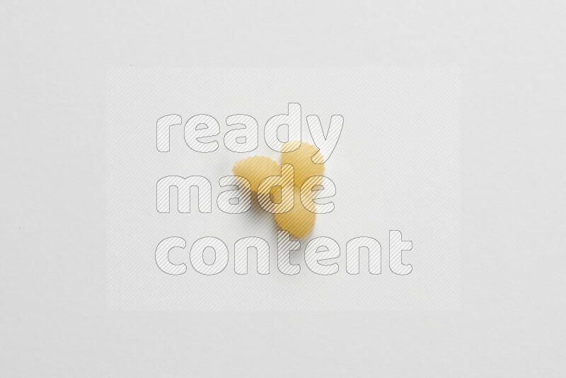 Shells pasta on white background