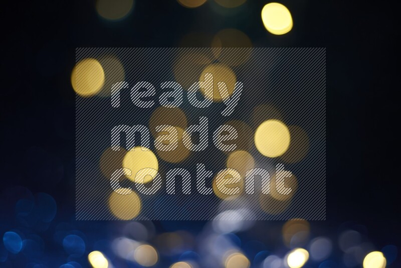 Bokeh light in yellow with blue background