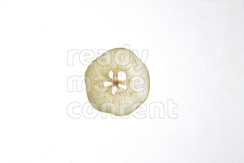 Pear slices on illuminated white background