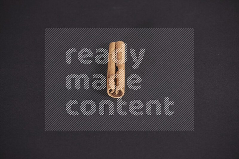 Cinnamon stick on black background