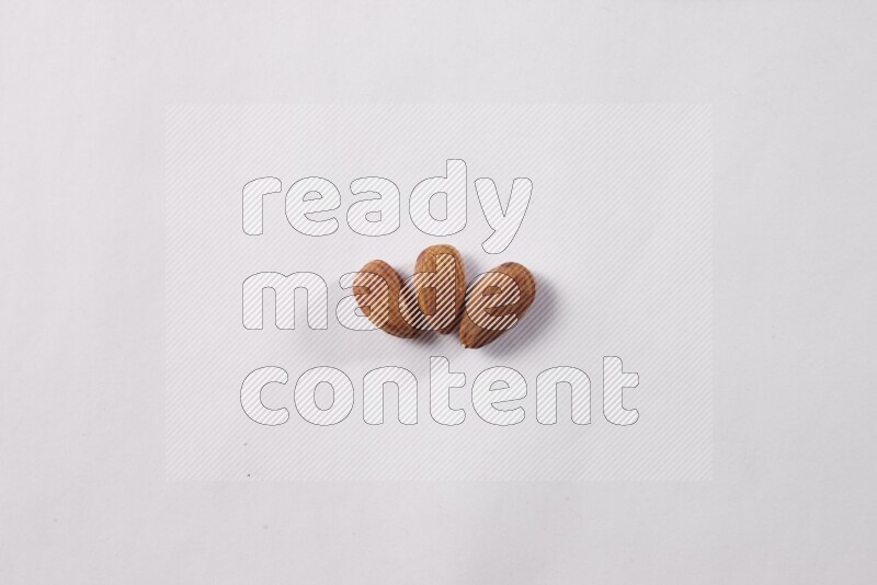 Almonds on white background