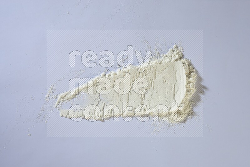 White powder strokes on white background