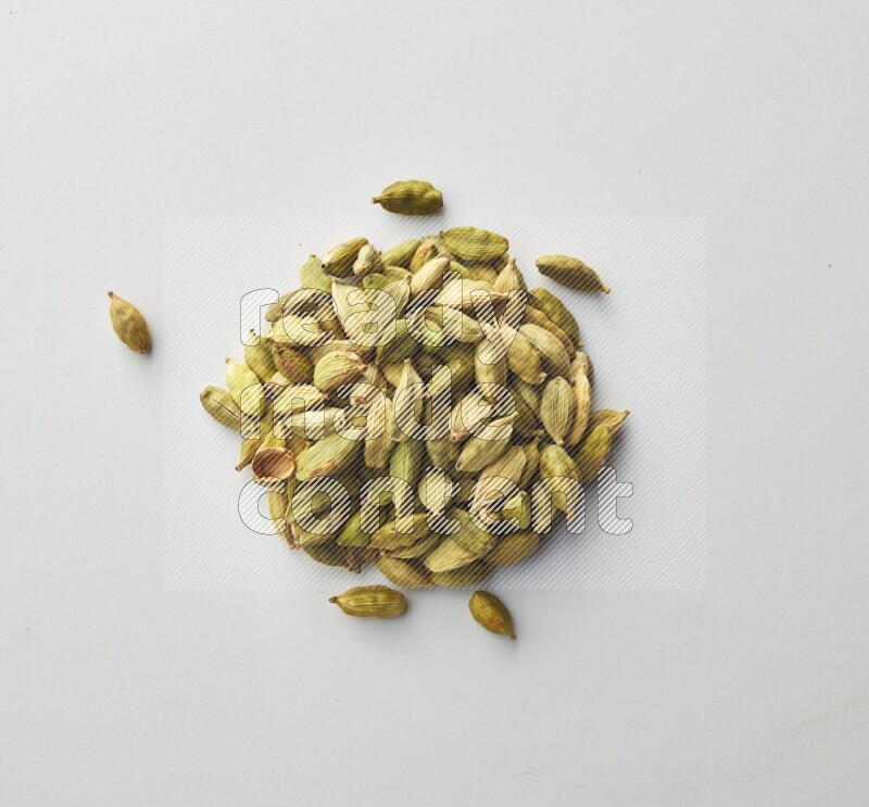 Top-view shot of Cardamon on white background