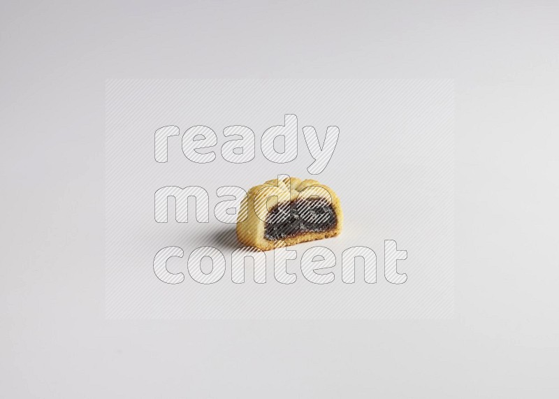 Half Maamoul filled with date direct on white background