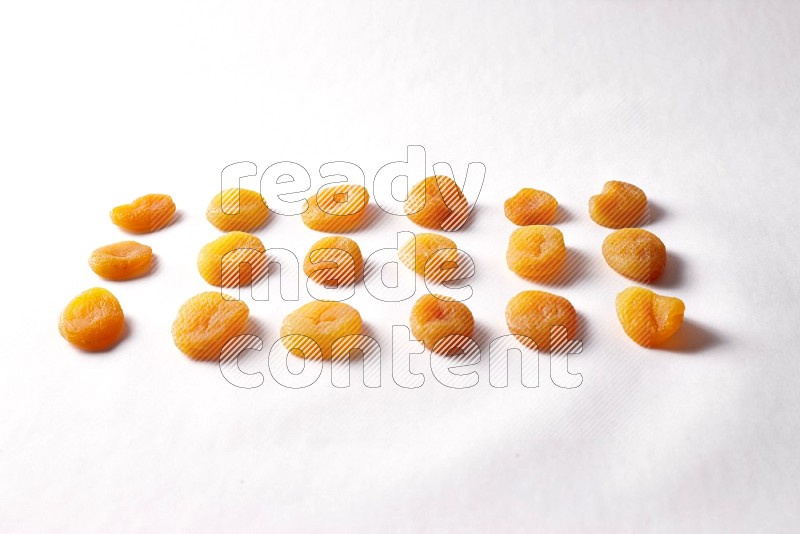 Dried apricots on white background