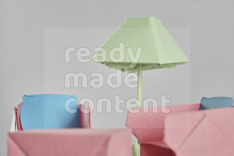 Origami living room on grey background