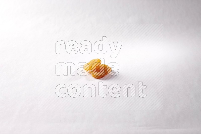 Dried apricots on white background